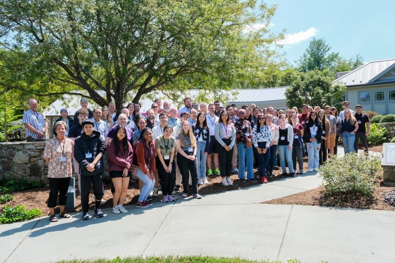 photo of faculty, staff and students of the biochemistry department taken outside on a sunny day
