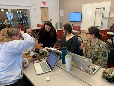 Biochemistry peer mentors working with first year students in First Year Experience course