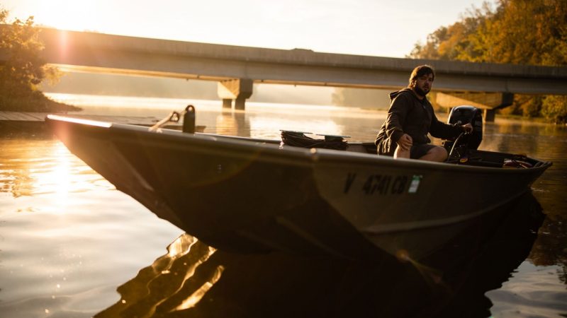 A small boat heading out in the early morning on the Occoquan Reservoir. 