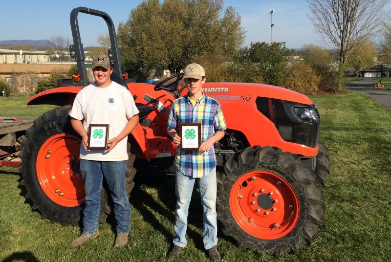 4-H members Cody Johnson, at left, and Garrett Hopkins 