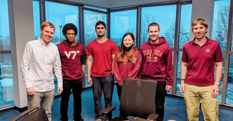 JW and the Blockchain Bois team, from left, Nicolas Hardy, Neal Mangaokar, Jiayi Lee, Zachary Geier, flanked by their Block.one mentors Serguei Vinnitskii and Zachary Butler   at the Block.one office in the Corporate Research Center.