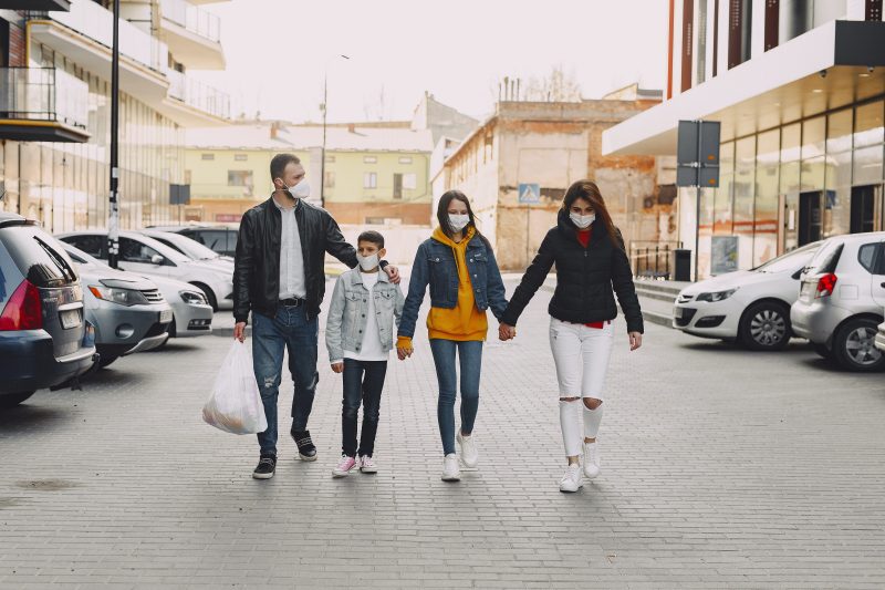 Image of family wearing masks 