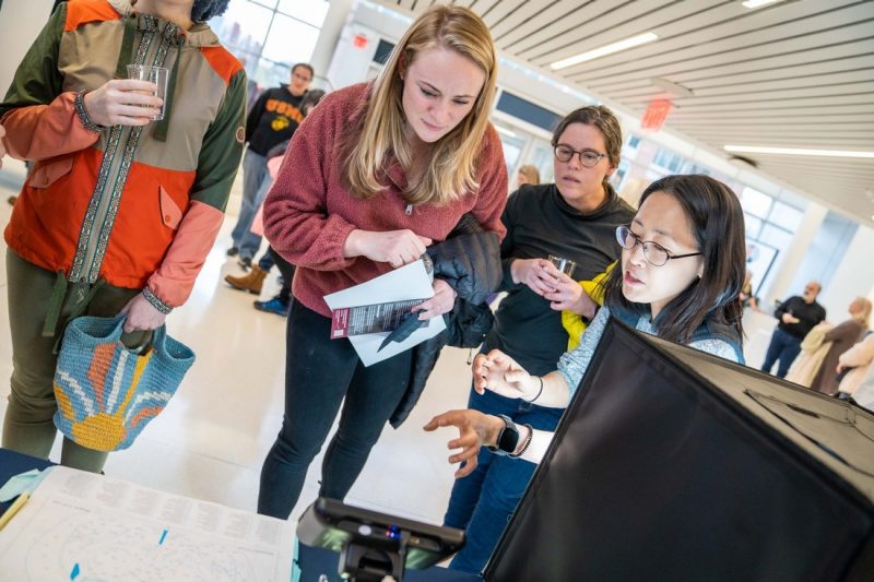 Researcher Sora Shin shares her work with community members during Brain School