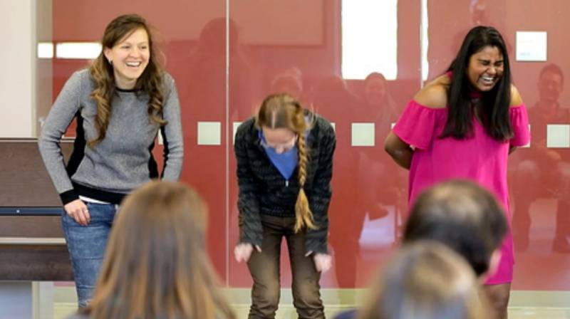 three women laughing