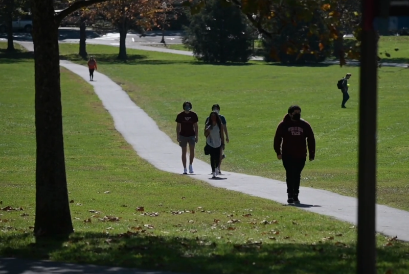 students walking on the Drillfield