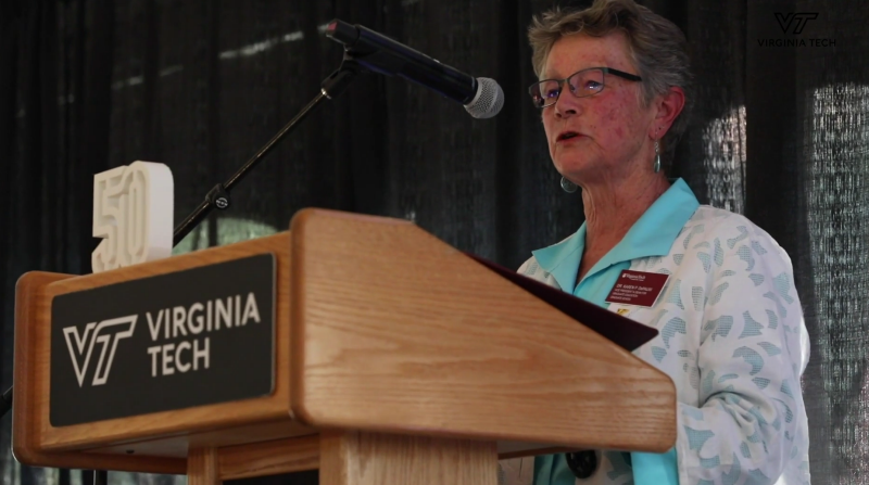 graduate school dean speaks during 50th year celebration