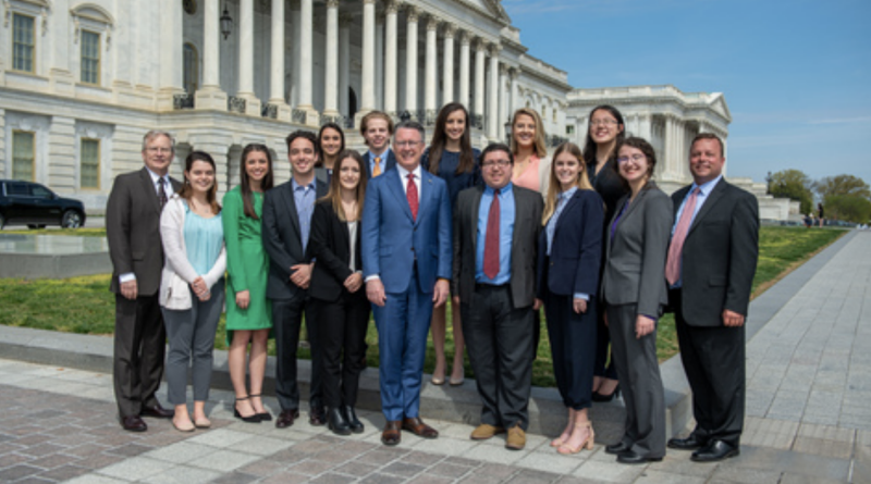 Hokies standing in front of Capitol Hill