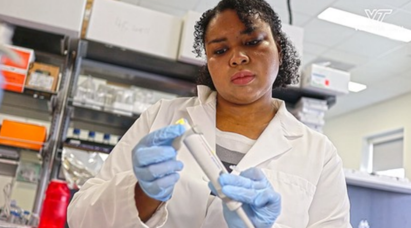 Michele Waters working in a lab